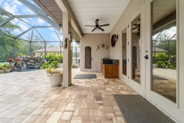 1711 145th St E, Sarasota, FL 34212 - view of patio / terrace featuring ceiling fan and glass enclosure