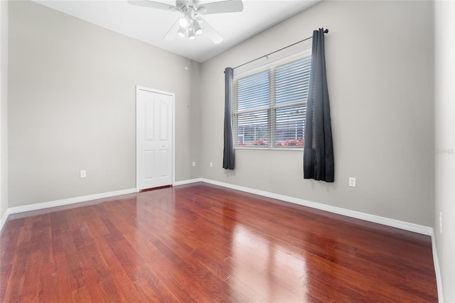 1711 145th St E, Sarasota, FL 34212 - spare room featuring ceiling fan and dark wood-type flooring