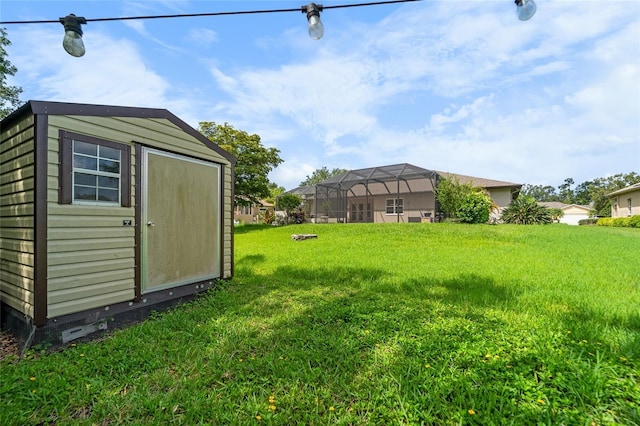 1711 145th St E, Sarasota, FL 34212 - view of grassy yard featuring a storage unit
