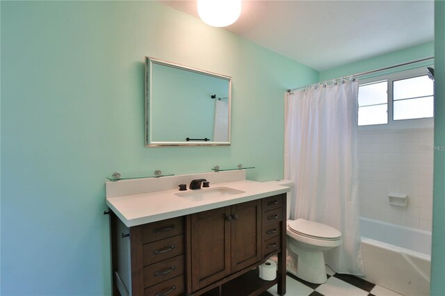 7355 Cass Cir, Sarasota, FL 34231 - bathroom featuring vanity, shower / bath combo, and tile patterned floors