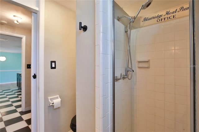 7355 Cass Cir, Sarasota, FL 34231 - bathroom with tile patterned floors and a stall shower