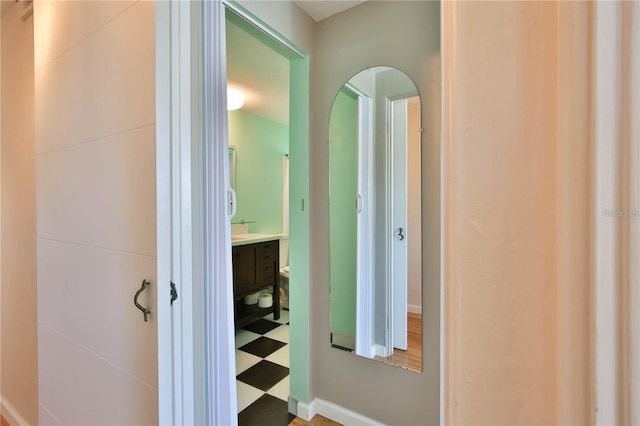 7355 Cass Cir, Sarasota, FL 34231 - bathroom featuring vanity and baseboards