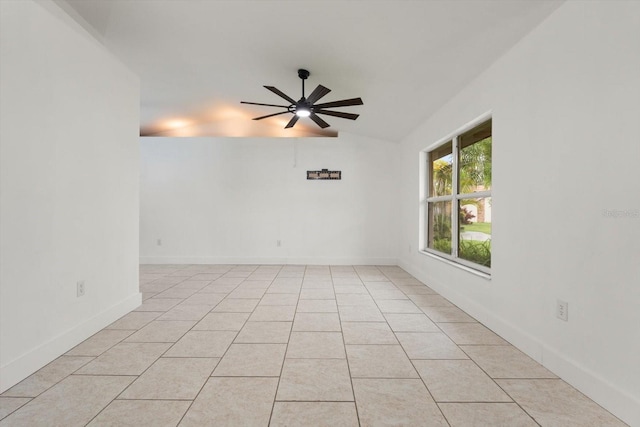 5433 81st Avenue Cir E, Palmetto, FL 34221 - spare room with vaulted ceiling, ceiling fan, light tile patterned floors, and baseboards