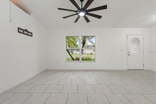 5433 81st Avenue Cir E, Palmetto, FL 34221 - spare room with ceiling fan, lofted ceiling, baseboards, and light tile patterned floors