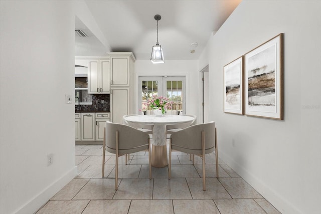 5433 81st Avenue Cir E, Palmetto, FL 34221 - dining area featuring light tile patterned flooring and baseboards