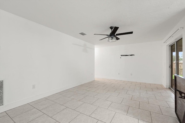 5433 81st Avenue Cir E, Palmetto, FL 34221 - spare room featuring a ceiling fan and light tile patterned flooring