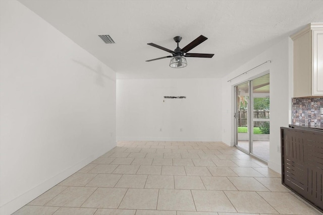 5433 81st Avenue Cir E, Palmetto, FL 34221 - spare room featuring a ceiling fan and light tile patterned floors
