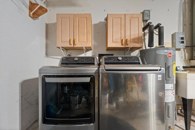 5433 81st Avenue Cir E, Palmetto, FL 34221 - laundry room featuring cabinet space, washing machine and clothes dryer, and electric water heater