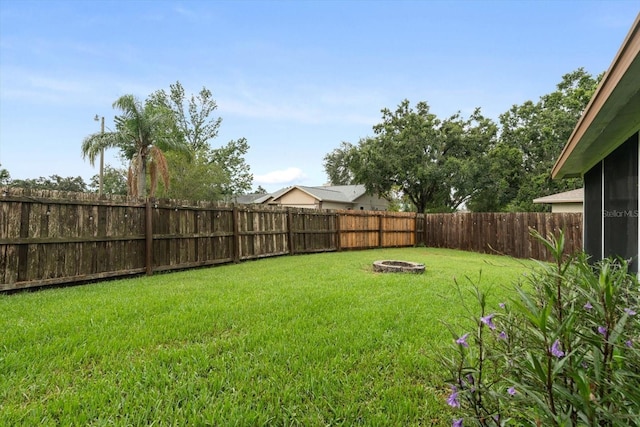 5433 81st Avenue Cir E, Palmetto, FL 34221 - view of yard with a fire pit