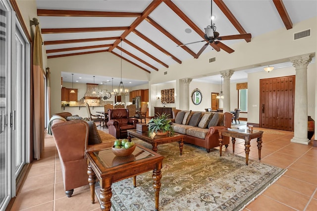 7025 Saddle Creek Cir, Sarasota, FL 34241 - living room featuring decorative columns, ceiling fan, light tile patterned floors, beam ceiling, and a chandelier