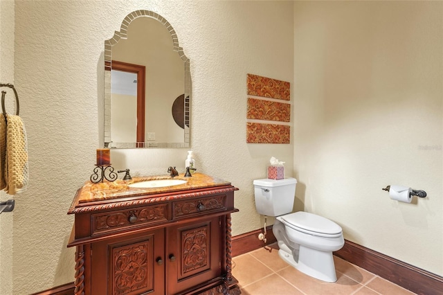 7025 Saddle Creek Cir, Sarasota, FL 34241 - half bathroom with tile patterned flooring, vanity, and a textured wall