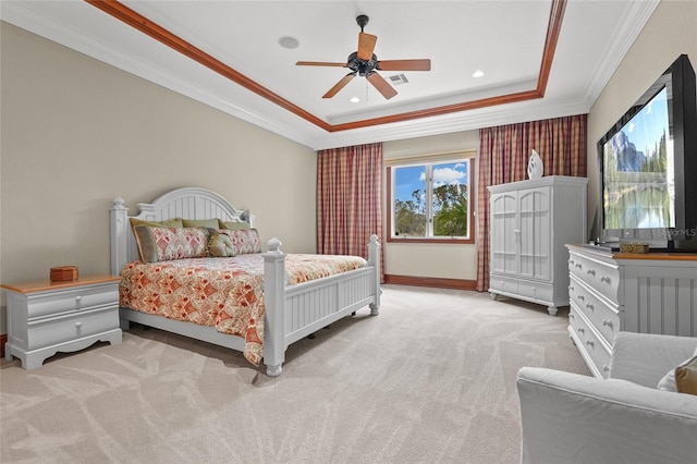 7025 Saddle Creek Cir, Sarasota, FL 34241 - bedroom featuring a tray ceiling, light colored carpet, ornamental molding, ceiling fan, and recessed lighting