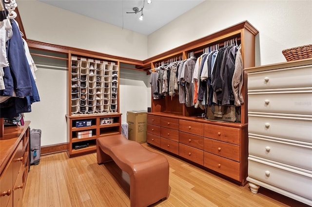 7025 Saddle Creek Cir, Sarasota, FL 34241 - spacious closet featuring light wood-style flooring