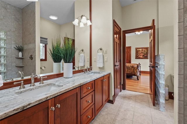 7025 Saddle Creek Cir, Sarasota, FL 34241 - full bath featuring ensuite bath, double vanity, and tile patterned flooring