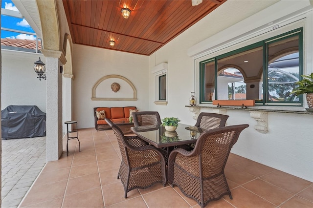 7025 Saddle Creek Cir, Sarasota, FL 34241 - view of patio / terrace with grilling area and outdoor dining space