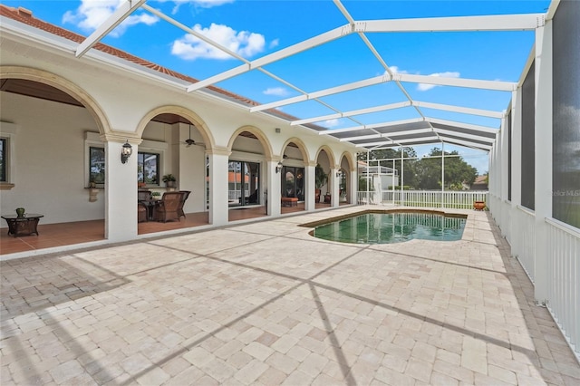 7025 Saddle Creek Cir, Sarasota, FL 34241 - swimming pool featuring a patio area, glass enclosure, and a ceiling fan