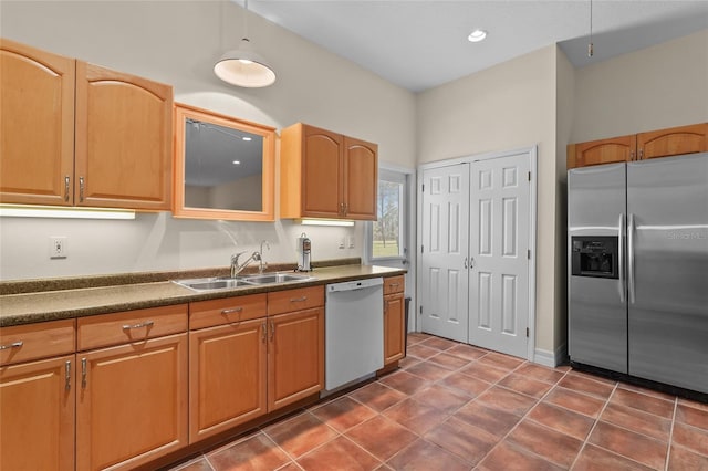 7025 Saddle Creek Cir, Sarasota, FL 34241 - kitchen featuring stainless steel refrigerator with ice dispenser, dishwasher, dark countertops, and dark tile patterned flooring