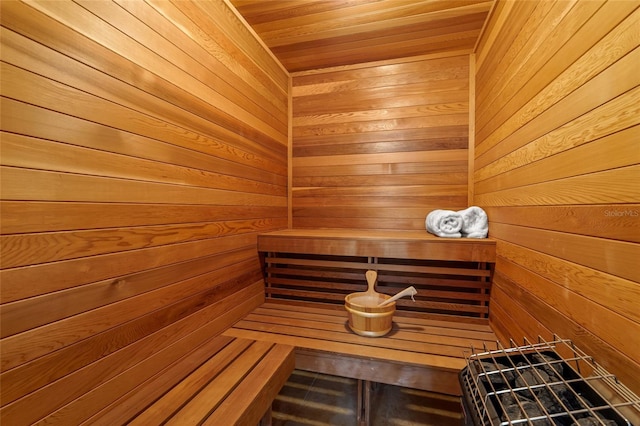 7025 Saddle Creek Cir, Sarasota, FL 34241 - relaxing sauna / steam room with wooden walls and wooden ceiling