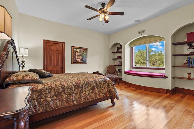 7025 Saddle Creek Cir, Sarasota, FL 34241 - bedroom with light wood-style floors and ceiling fan