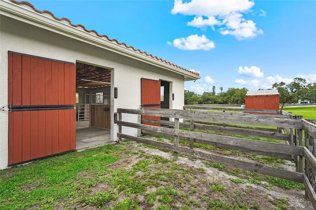7025 Saddle Creek Cir, Sarasota, FL 34241 - view of yard with an exterior structure and an outbuilding