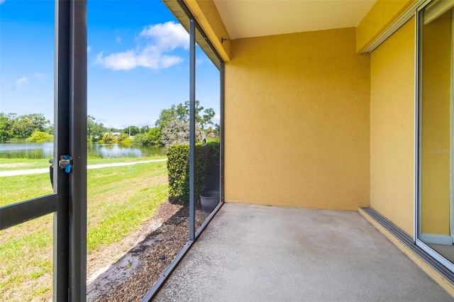 5609 Spanish Point Ct, Palmetto, FL 34221 - unfurnished sunroom featuring a water view
