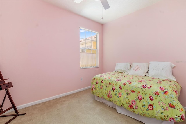 5609 Spanish Point Ct, Palmetto, FL 34221 - bedroom with carpet flooring, baseboards, and ceiling fan