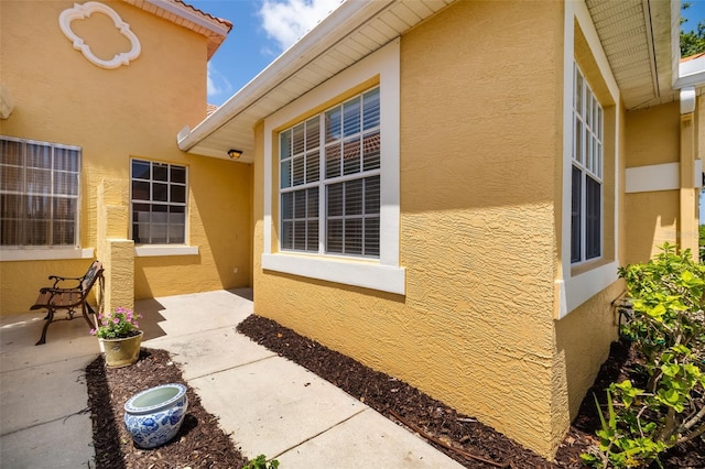 5609 Spanish Point Ct, Palmetto, FL 34221 - property entrance featuring stucco siding