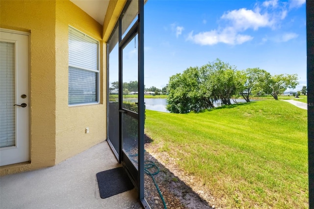 5609 Spanish Point Ct, Palmetto, FL 34221 - sunroom / solarium with a water view
