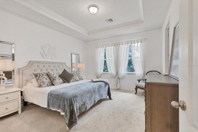 4524 Baltry Ct, Bradenton, FL 34211 - bedroom featuring light carpet, a tray ceiling, and ornamental molding