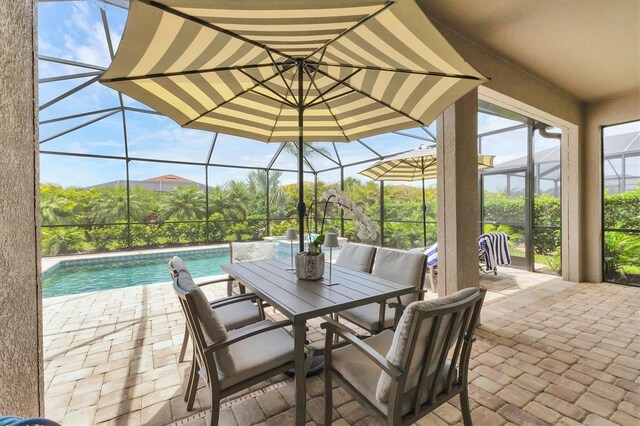 4524 Baltry Ct, Bradenton, FL 34211 - view of patio featuring a lanai, an outdoor pool, and outdoor dining space