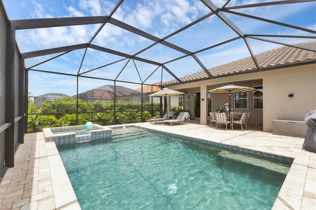 4524 Baltry Ct, Bradenton, FL 34211 - view of pool with a patio, a pool with connected hot tub, and glass enclosure
