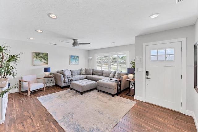 7727 9th Avenue Dr NW, Bradenton, FL 34209 - living area featuring hardwood / wood-style floors, recessed lighting, a textured ceiling, ceiling fan, and baseboards