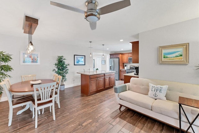 7727 9th Avenue Dr NW, Bradenton, FL 34209 - living area featuring hardwood / wood-style flooring, ceiling fan, baseboards, and recessed lighting
