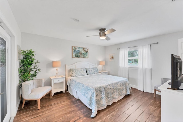 7727 9th Avenue Dr NW, Bradenton, FL 34209 - bedroom with wood finished floors, ceiling fan, and baseboards