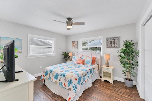 7727 9th Avenue Dr NW, Bradenton, FL 34209 - bedroom with baseboards, dark wood finished floors, and a ceiling fan