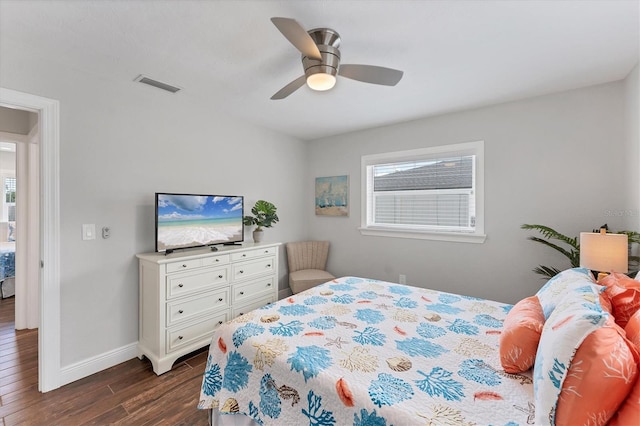 7727 9th Avenue Dr NW, Bradenton, FL 34209 - bedroom featuring dark wood-style flooring, baseboards, and ceiling fan