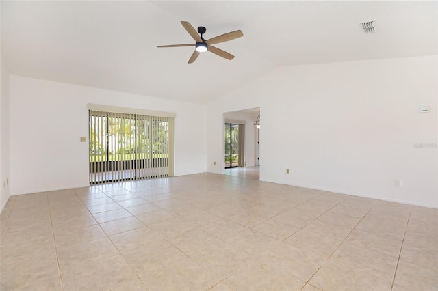 7401 3rd Ave NW, Bradenton, FL 34209 - unfurnished room with a ceiling fan, plenty of natural light, vaulted ceiling, and light tile patterned flooring