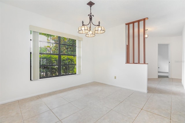 7401 3rd Ave NW, Bradenton, FL 34209 - spare room featuring a chandelier and light tile patterned flooring