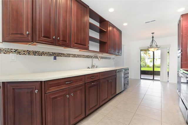 7401 3rd Ave NW, Bradenton, FL 34209 - kitchen featuring stainless steel dishwasher, open shelves, backsplash, light countertops, and pendant lighting