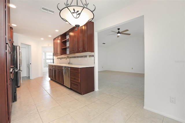 7401 3rd Ave NW, Bradenton, FL 34209 - kitchen featuring stainless steel dishwasher, open shelves, light countertops, ceiling fan, and light tile patterned floors