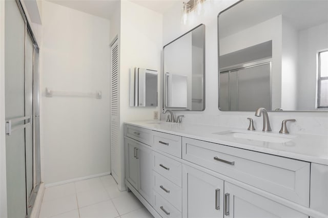 7401 3rd Ave NW, Bradenton, FL 34209 - full bath featuring double vanity, a stall shower, and a closet