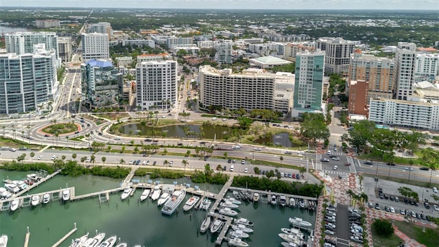 1255 N Gulfstream Ave Unit 1104, Sarasota, FL 34236 - aerial view of property's location featuring a large body of water, nearby urban area, and numerous boat docks