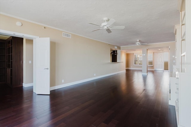 1255 N Gulfstream Ave Unit 1104, Sarasota, FL 34236 - unfurnished living room with a ceiling fan, dark wood-style floors, ornamental molding, baseboards, and a textured ceiling