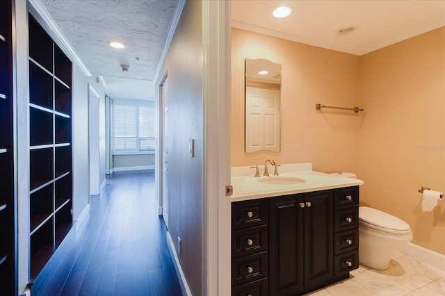 1255 N Gulfstream Ave Unit 1104, Sarasota, FL 34236 - bathroom with baseboards, toilet, vanity, and recessed lighting