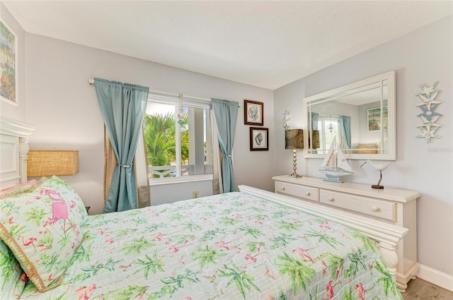 767 John Ringling Blvd Unit 25, Sarasota, FL 34236 - bedroom featuring baseboards