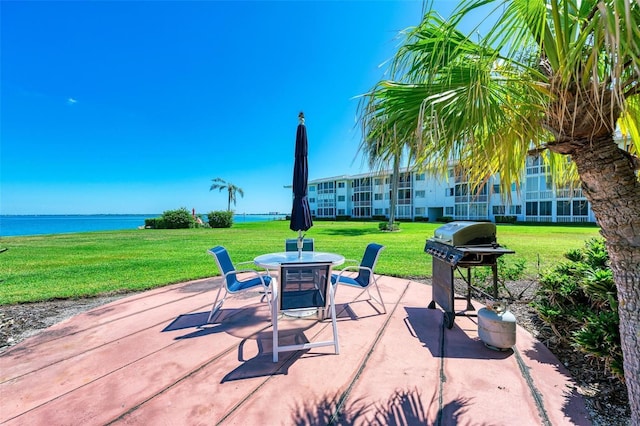767 John Ringling Blvd Unit 25, Sarasota, FL 34236 - view of patio / terrace featuring a water view and grilling area