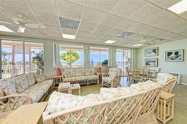 767 John Ringling Blvd Unit 25, Sarasota, FL 34236 - living area with a drop ceiling and a ceiling fan