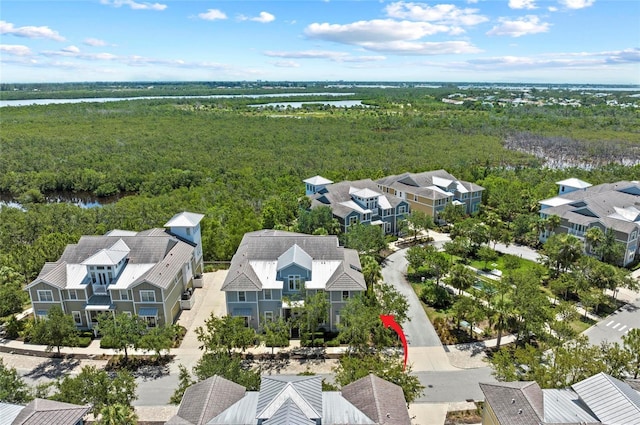 315 Sapphire Lake Dr Unit 101, Bradenton, FL 34209 - aerial perspective of suburban area featuring a heavily wooded area and a large body of water