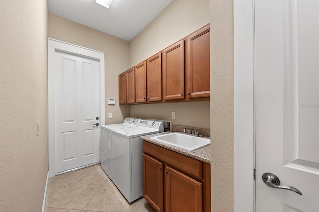 315 Sapphire Lake Dr Unit 101, Bradenton, FL 34209 - washroom with independent washer and dryer, cabinet space, and light tile patterned floors