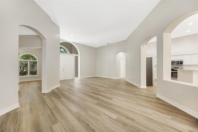 5103 Twin Creeks Dr, Valrico, FL 33596 - spare room with light wood finished floors and recessed lighting